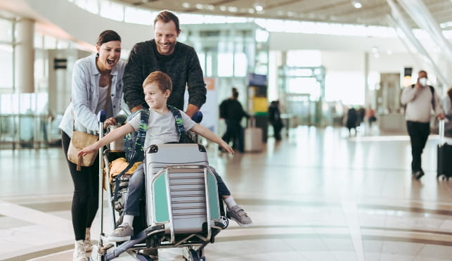 Smiling family at the airport